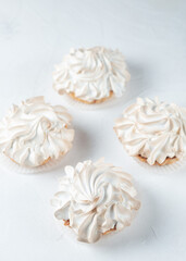 Fresh pastries, cakes from the bakery on a light background