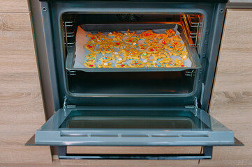 Homemade cookies in the oven in the kitchen.