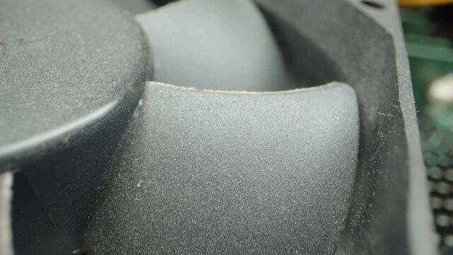 Closer look ofo the black fan of the computer inside the CPU