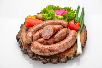 Home made sausage on a wooden board