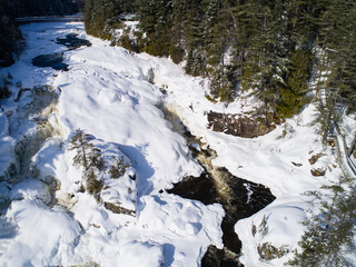 Fototapeta na wymiar River aerial view of winter flowing waters