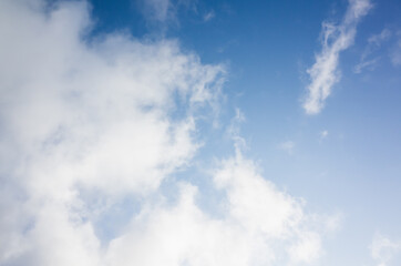 Blue sky with white cumulus clouds at daytime