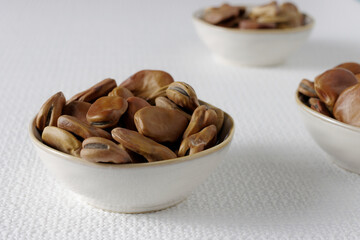 Dried fava beans (Vicia faba) close-up. Vegan protein food.