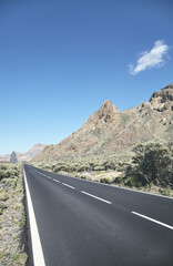 Scenic road in Teide National Park, color toning applied, Tenerife, Spain.