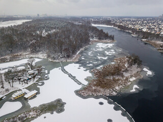 The freezing river in Kiev. Aerial drone view. Winter snowy morning.