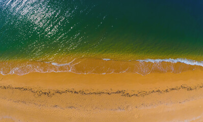 Aerial view of sunny golden beach with turquoise water top view
