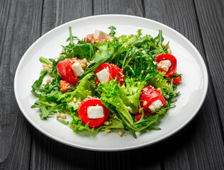 Georgian dish pepper rolls, with salad and arugula