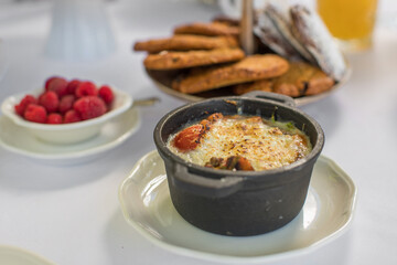 Early meal with fried eggs served in pan. Breakfast Buffet Concept, Breakfast Timeю. Various brunch on the table