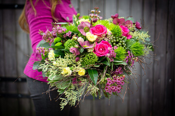 Bright and gorgeous flower floral bouquet of lovely red flowers for Valentines day. Close up photo