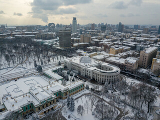 Snow-covered Mariinsky palace in Kiev. Aerial drone view. Winter snowy morning.