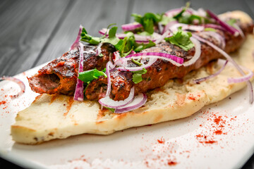 Georgian cuisine - lulia kebab, with grilled onions, traditional Georgian cuisine