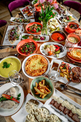 Georgian cuisine. A large laid table of different dishes