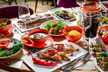 Georgian cuisine. A large laid table of different dishes