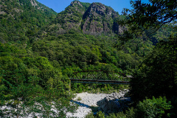 View on the rusty bridge over the Orrido di Ponte Brolla, Switzerland