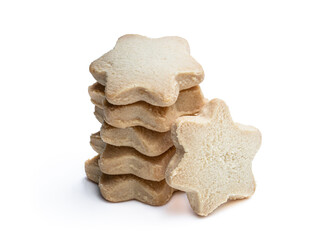 Stack of star shape spice cookies isolated on white