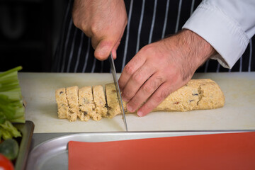Chef preparing cookies in his kitchen.