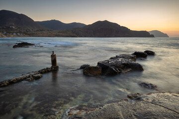 Fototapeta na wymiar Sunrise on the coast of Isleta del Moro. Natural Park of Cabo de Gata. Spain.