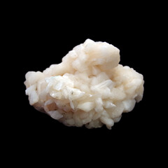 Natural crude stilbite stone on black background  