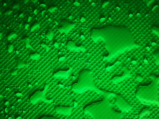 Splashes of water on shower tray highlighted in color