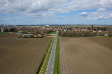 Long straight street leading to the Dutch town of Westdorpe