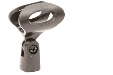 Black plastic microphone holder isolated above white background