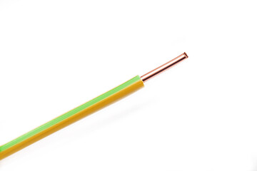 Copper wire with yellow and green markings on a white background