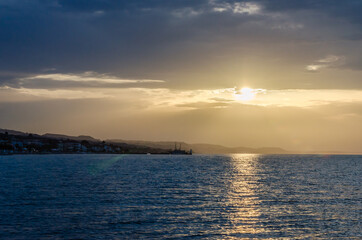 Naklejka premium Sunset over the coastal, tourist, place Pefkohori, Greece 
