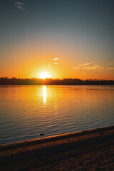 red sunset over river. beautiful summer sunset