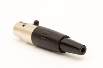 Plastic input Speakon for large speakers isolated above white background