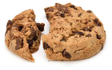 One broken Chocolate chip cookie isolated on white background. Sweet biscuit crumbs. Homemade pastry.