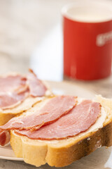 Sandwich with sliced dried ham on the bread