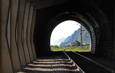 Fototapeta na wymiar Circum-Baikal Railway. View from the tunnel to the railway station