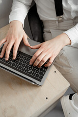 Fototapeta na wymiar guy hands typing text on laptop, remote work