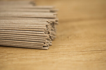 soba - buckwheat noodles (raw buckwheat noodles). soba noodles. food background