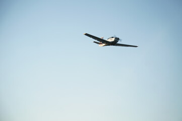 Small plane flying in the air