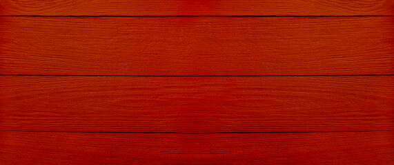 Abstract red wooden background for your holiday advertising. The texture of the tree. Top view. Banner with copy space