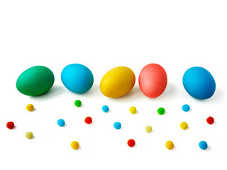 Colorful Easter eggs with confetti isolated on a white background with space for text