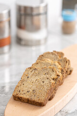 Healthy dark flour toast bread on the wooden board.