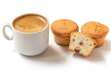 homemade mini cupcakes with raisins and a cup of coffee on a white surface