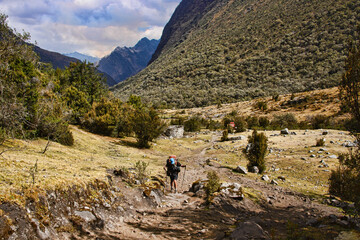 Obraz premium A trekker heading to Union Pass on the Santa Cruz trek, Cordillera Blanca, Ancash, Per