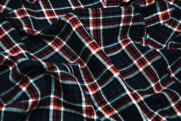 Woolen checkered fabric texture. Warm winter blanket