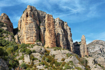 Fototapeta na wymiar Rocky cliffs close to Vadiello reservoir in Guara Natural Park, Huesca, Spain