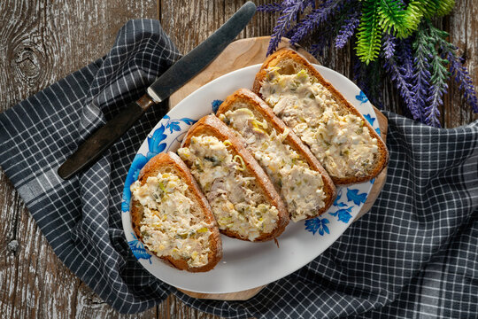 Sandwiches with a paste of mackerel, egg and cucumber.