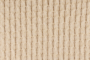 Brown Beige Knitwear Fabric Background. Knitted Texture.