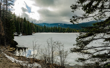 Frozen mountain lake, Washington state, US