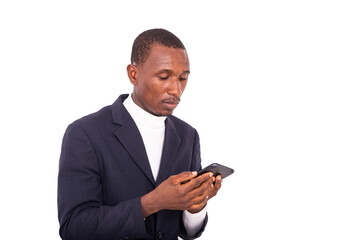 close-up of a handsome businessman looking at cellphone.