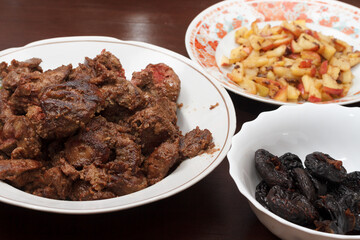 A set of products for making chicken liver pate with prunes and apple.