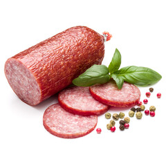 Salami smoked sausage, basil leaves and peppercorns isolated on white background cutout