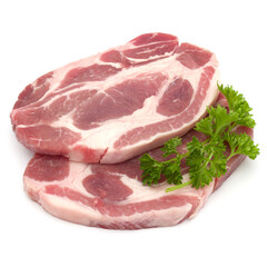 Raw pork neck chop meat with parsley herb leaves garnish isolated on white background cutout