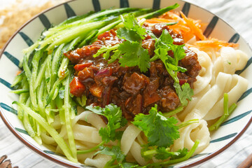 Homemade ramen noodles with soybean paste close up. Zhajiangmian.
